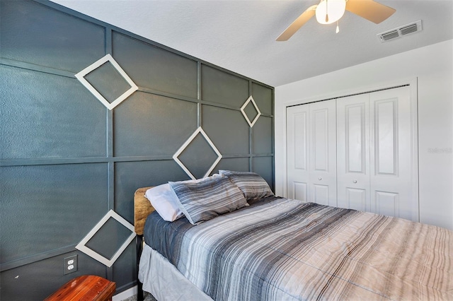 bedroom with a closet and ceiling fan