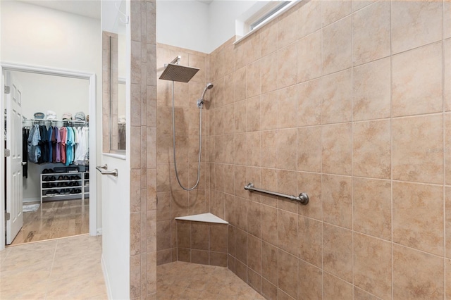 bathroom featuring tiled shower