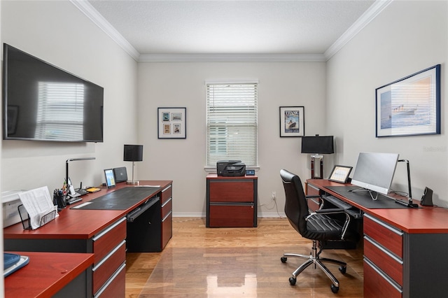 home office featuring ornamental molding and light hardwood / wood-style floors