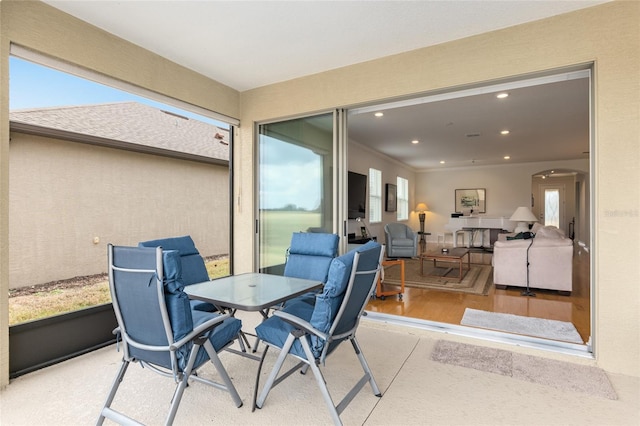 sunroom / solarium with a healthy amount of sunlight