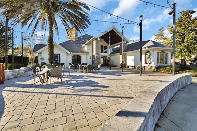surrounding community with a patio