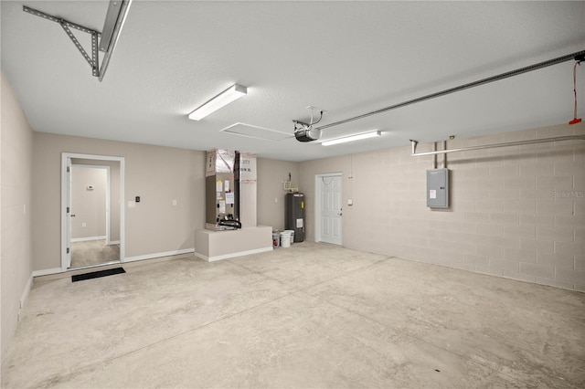 garage with heating unit, a garage door opener, electric panel, and electric water heater