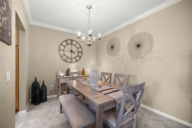 carpeted dining room with crown molding and a chandelier