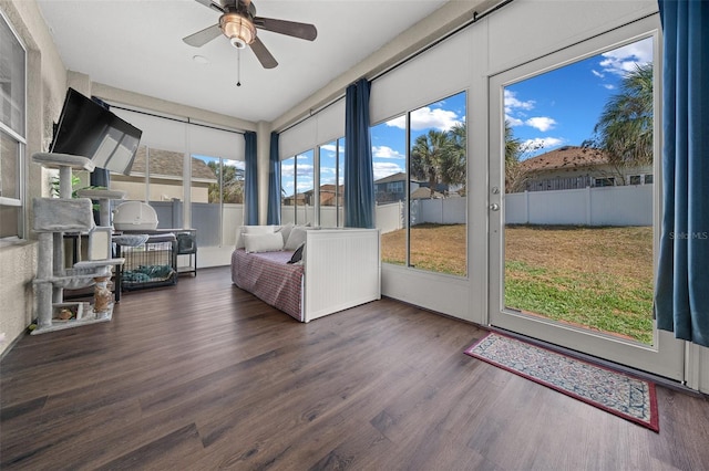 sunroom / solarium with ceiling fan