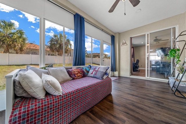 sunroom with ceiling fan