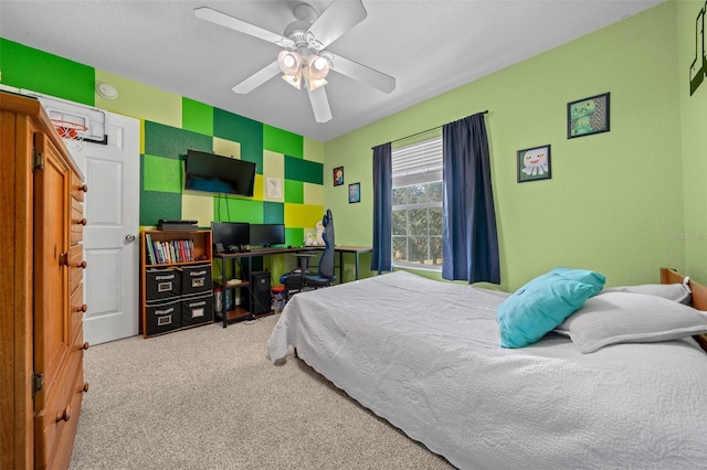 bedroom with light carpet and ceiling fan