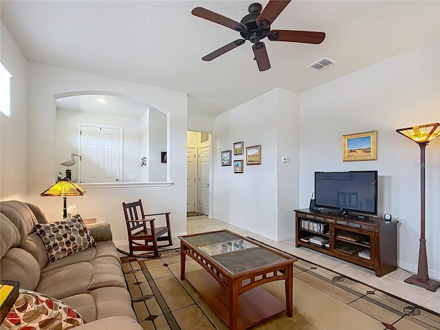 living room featuring ceiling fan