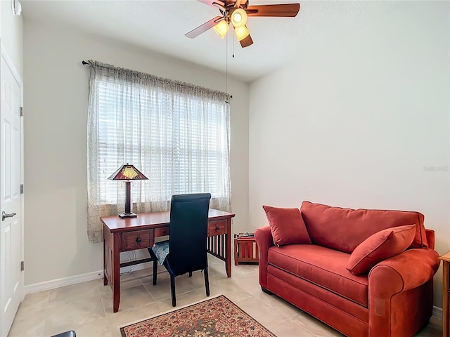 tiled home office with ceiling fan