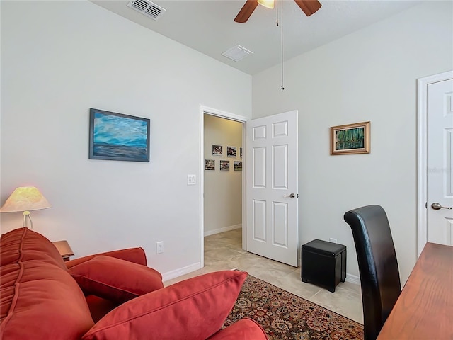 tiled office space with ceiling fan