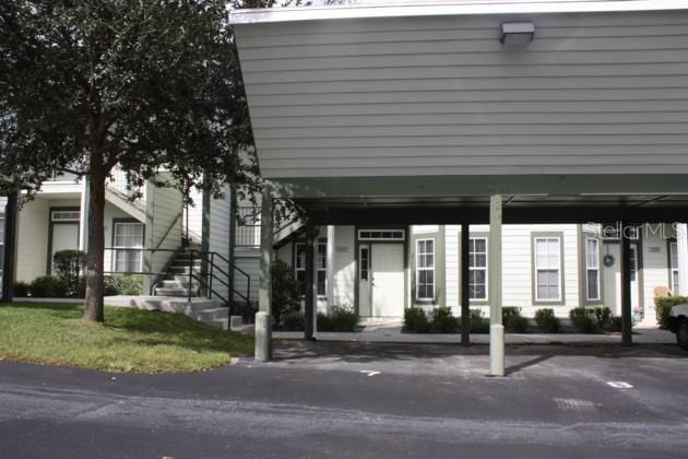 exterior space featuring a carport