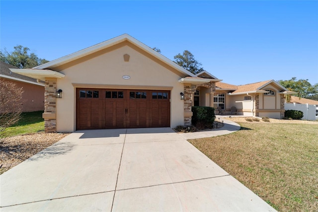 ranch-style house featuring a garage and a front yard