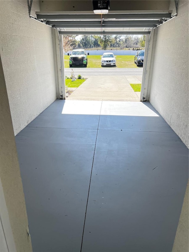 garage featuring a garage door opener