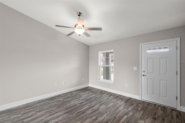foyer with ceiling fan, dark hardwood / wood-style flooring, and vaulted ceiling