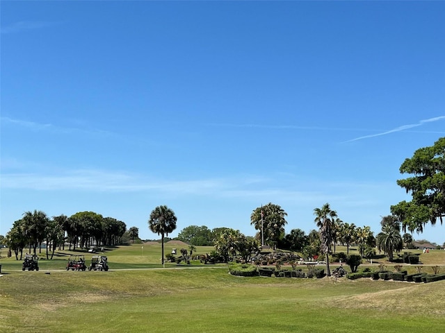 5500 NW 23rd Pl, Ocala, FL 34482 - view of home's community featuring a lawn and view of golf course