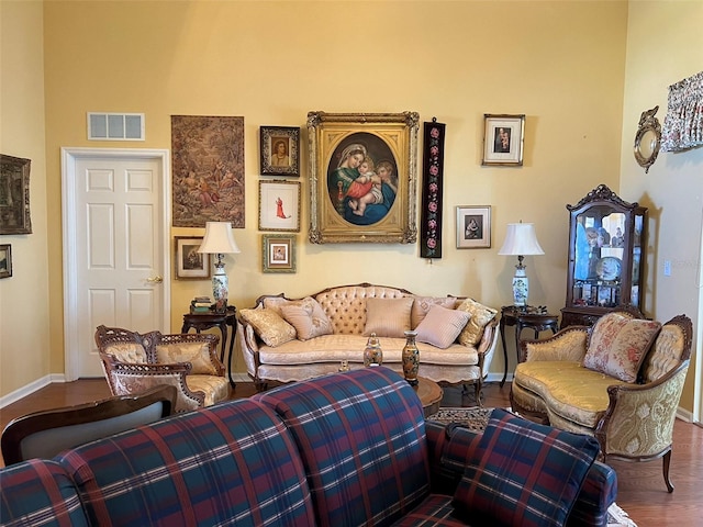 5500 NW 23rd Pl, Ocala, FL 34482 - living room with baseboards, visible vents, and wood finished floors
