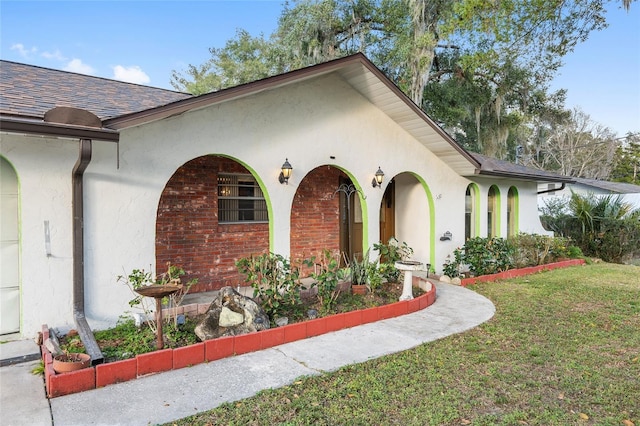 exterior space with a lawn