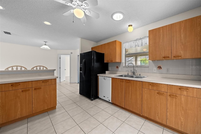 912 Chula Ct, Lady Lake, FL 32159 - kitchen with sink, light tile patterned floors, dishwasher, tasteful backsplash, and black fridge with ice dispenser
