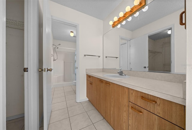 912 Chula Ct, Lady Lake, FL 32159 - bathroom with tile patterned flooring, vanity, a textured ceiling, curtained shower, and toilet