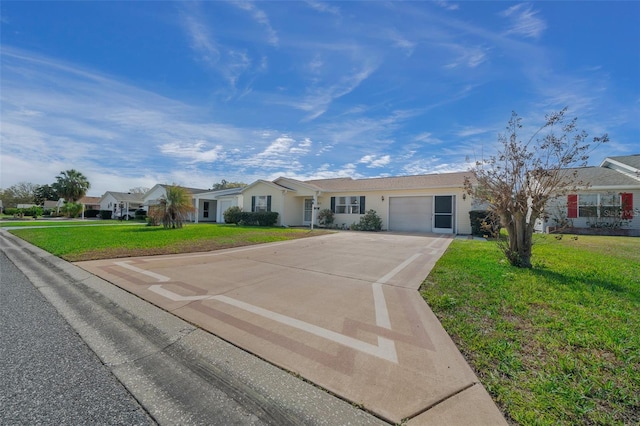 912 Chula Ct, Lady Lake, FL 32159 - ranch-style house featuring a garage and a front lawn