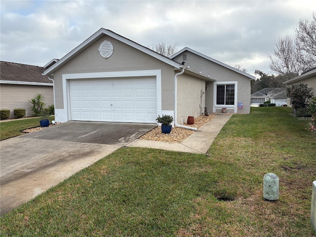 ranch-style home featuring a garage and a front lawn