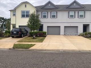 view of front of house with a garage and driveway