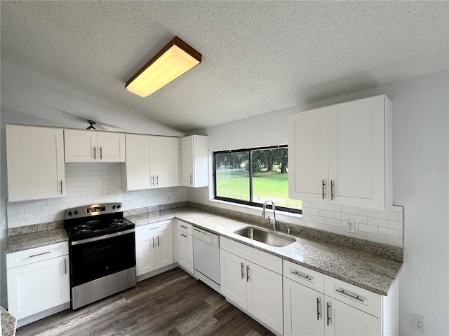 kitchen featuring sink, dark hardwood / wood-style floors, white dishwasher, white cabinets, and stainless steel range with electric cooktop