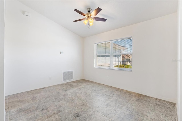 unfurnished room featuring lofted ceiling, visible vents, and a ceiling fan