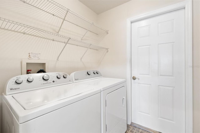 laundry area with laundry area and washer and dryer