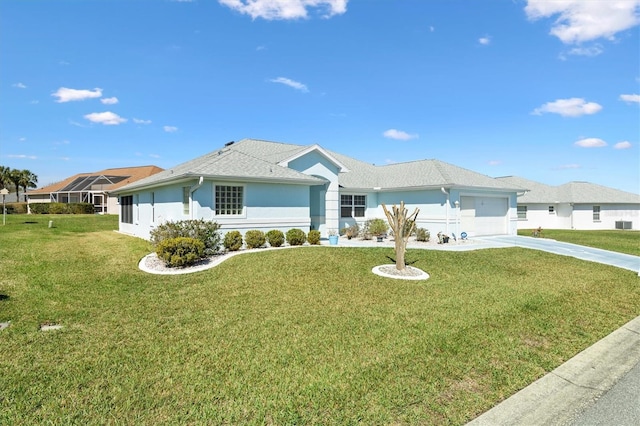 ranch-style house with a garage, concrete driveway, a front yard, and stucco siding