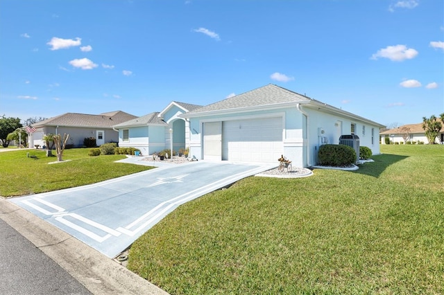 single story home featuring a garage, driveway, and a front lawn