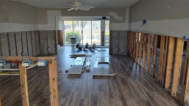 workout area featuring wood finish floors