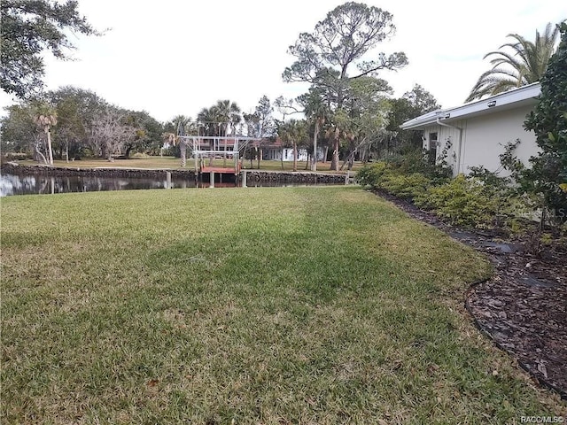 view of yard with a water view