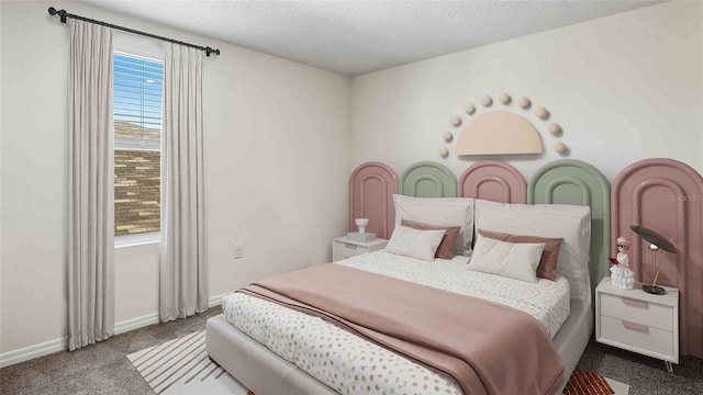 bedroom featuring carpet and a textured ceiling