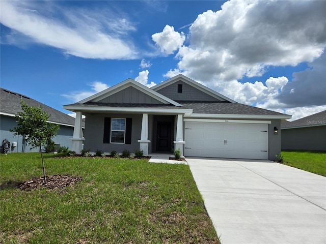 336 W Twisted Oaks Dr, Beverly Hills, FL 34465 - craftsman house featuring an attached garage, a front lawn, driveway, roof with shingles, and a porch