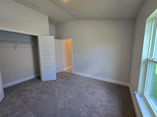 336 W Twisted Oaks Dr, Beverly Hills, FL 34465 - unfurnished bedroom with carpet flooring, vaulted ceiling, and a closet