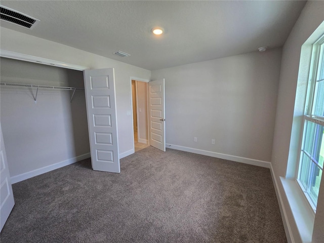 336 W Twisted Oaks Dr, Beverly Hills, FL 34465 - unfurnished bedroom featuring carpet floors, a closet, and recessed lighting