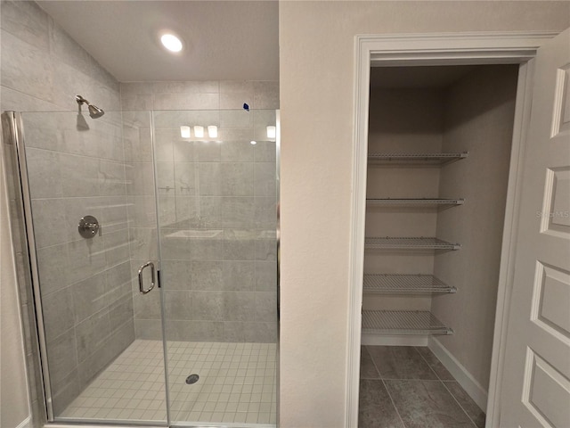 336 W Twisted Oaks Dr, Beverly Hills, FL 34465 - bathroom with a stall shower and tile patterned flooring