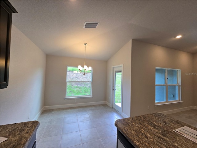 336 W Twisted Oaks Dr, Beverly Hills, FL 34465 - unfurnished dining area with a chandelier, light tile patterned floors, vaulted ceiling, and recessed lighting