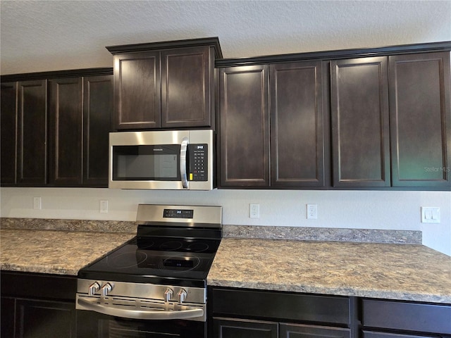 336 W Twisted Oaks Dr, Beverly Hills, FL 34465 - kitchen featuring appliances with stainless steel finishes and dark brown cabinets