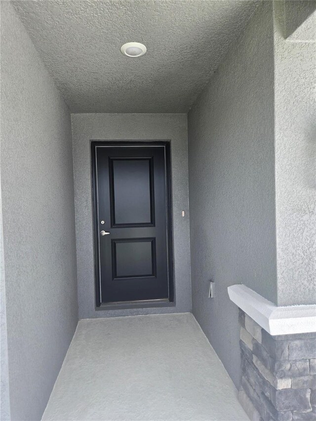 336 W Twisted Oaks Dr, Beverly Hills, FL 34465 - entrance to property featuring stucco siding