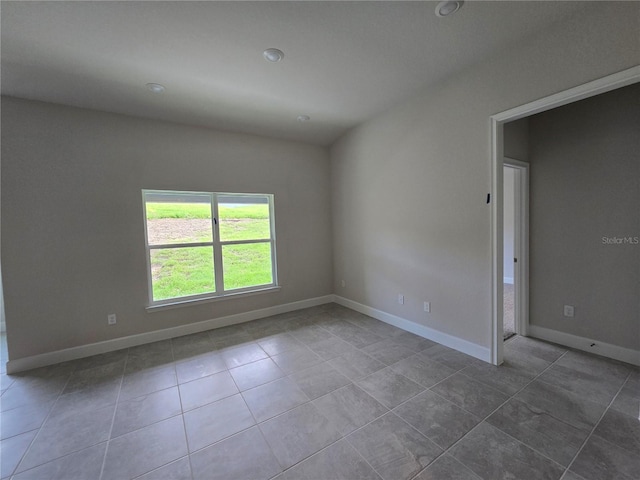 336 W Twisted Oaks Dr, Beverly Hills, FL 34465 - tiled spare room with recessed lighting
