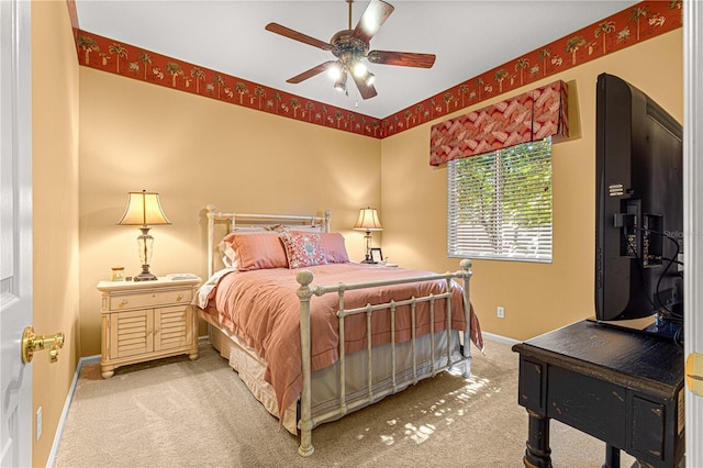 bedroom with ceiling fan and carpet