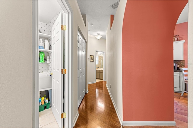 hallway featuring light wood-type flooring