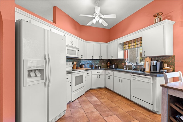 kitchen featuring sink, white cabinetry, ceiling fan, white appliances, and decorative backsplash