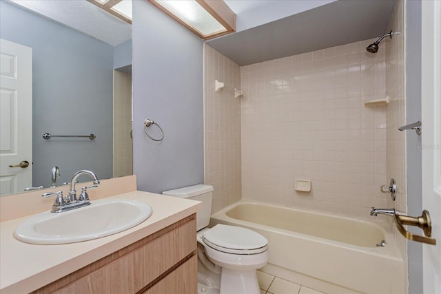 full bathroom with toilet, bathtub / shower combination, vanity, and tile patterned floors