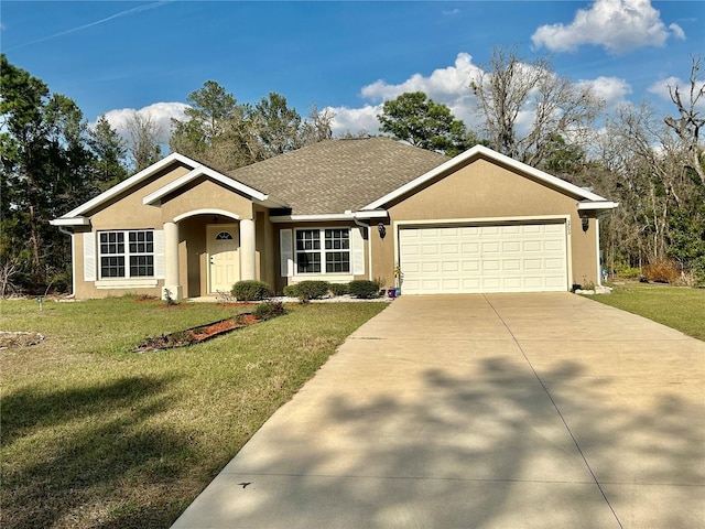 ranch-style home with a garage and a front lawn