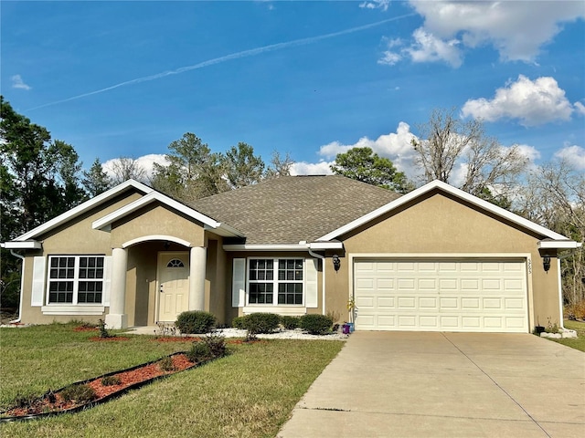 ranch-style home with a garage and a front yard