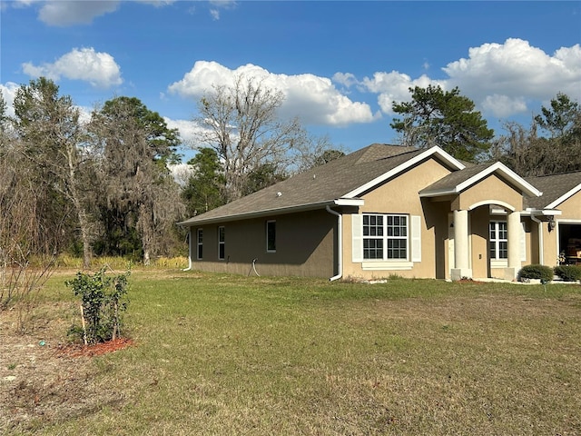 exterior space with a lawn