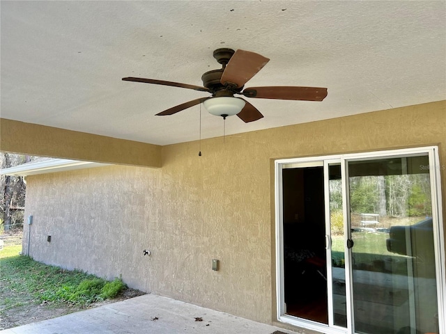 view of patio / terrace featuring ceiling fan