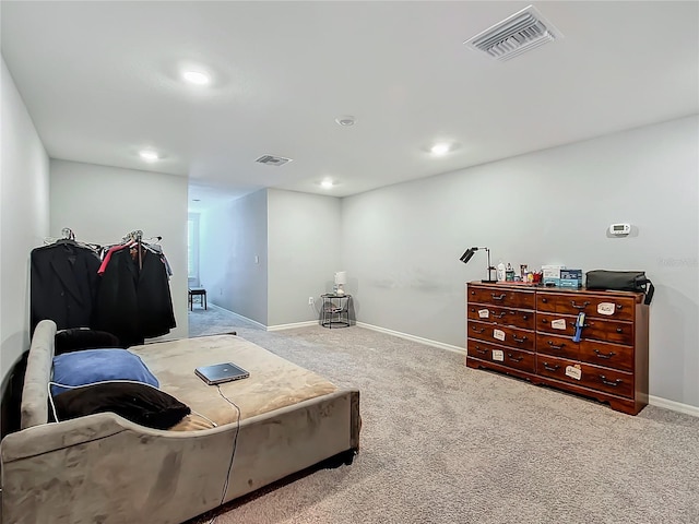 bedroom featuring recessed lighting, visible vents, light carpet, and baseboards